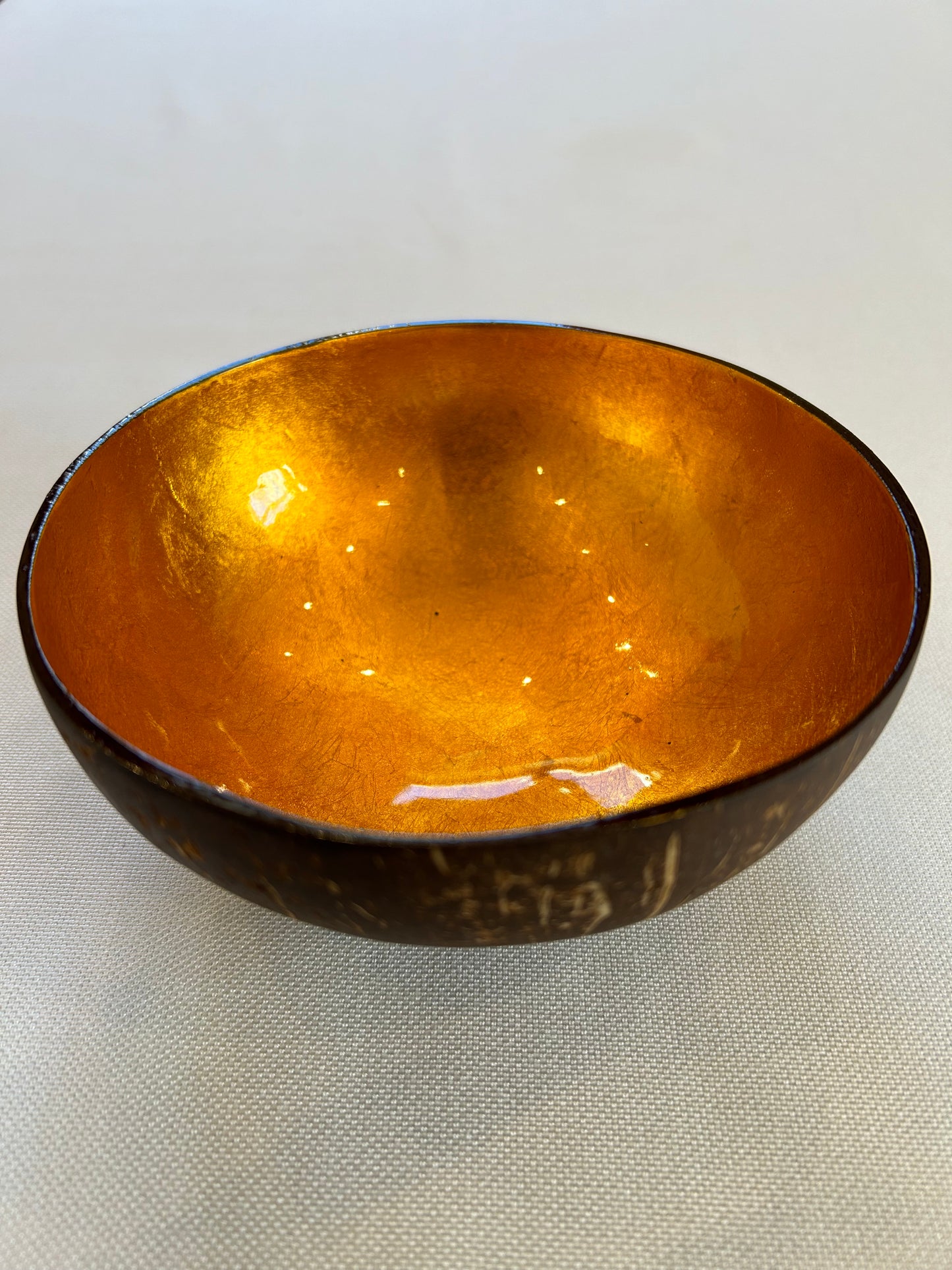 Kokosnussschale gold